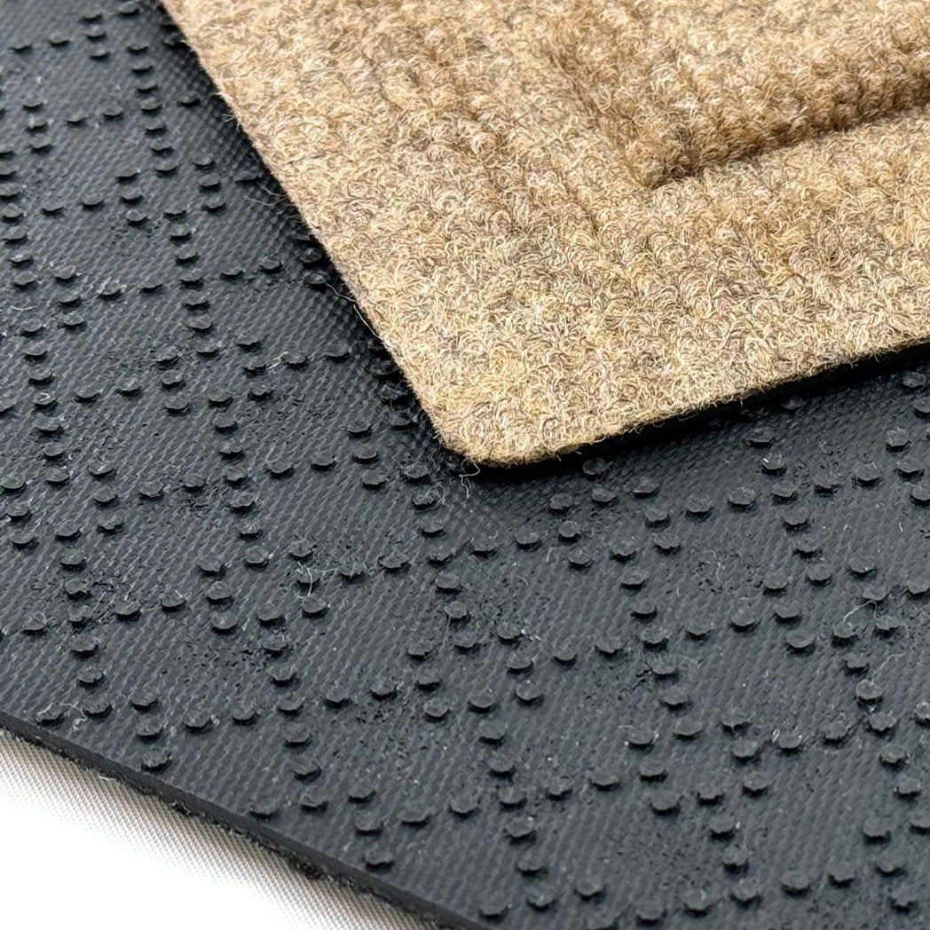 Close up of WaterHog incredibly durable rubber backing that's made in-house and engineered to not crack, crumble, or rot.