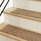Bi-level leafy design on protective WaterHog stair treads