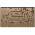 Outdoor WaterHog RV Large Door mat in tan with a design of an RV at a campsite with fir trees and a sunset.