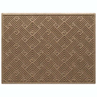 WaterHog Litter Box Mat is a durable litter trapping mat, made in the USA. A double-sized mat, shown in a golden/beige color featuring a bi-level design and durable rubber backing to protect underlying floors.