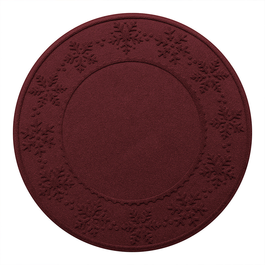Circular WaterHog Tree Skirt in a deep, wine-red with snowflake patterns with durable rubber backing on a white background