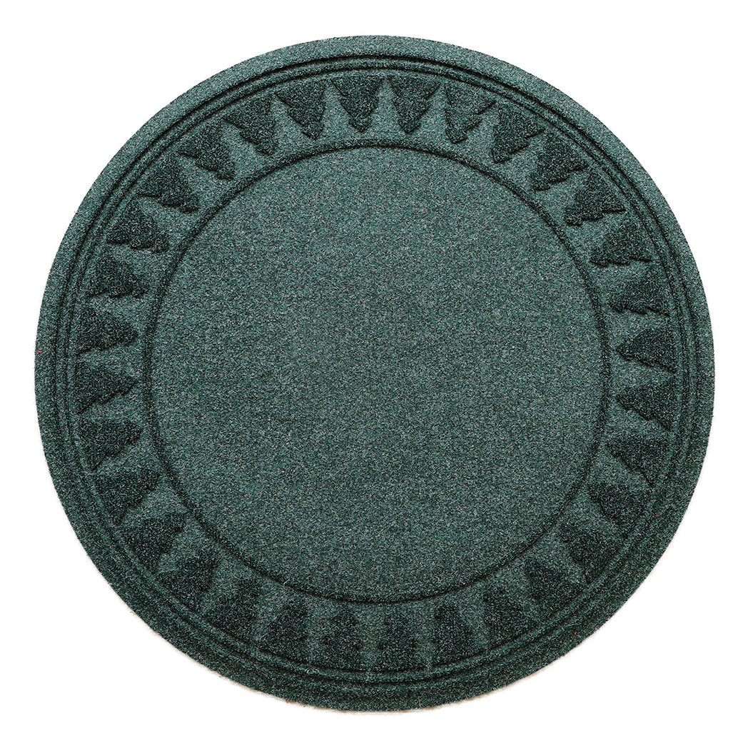 Round, deep green WaterHog tree skirt mat with a tree pattern around the rim on a white background