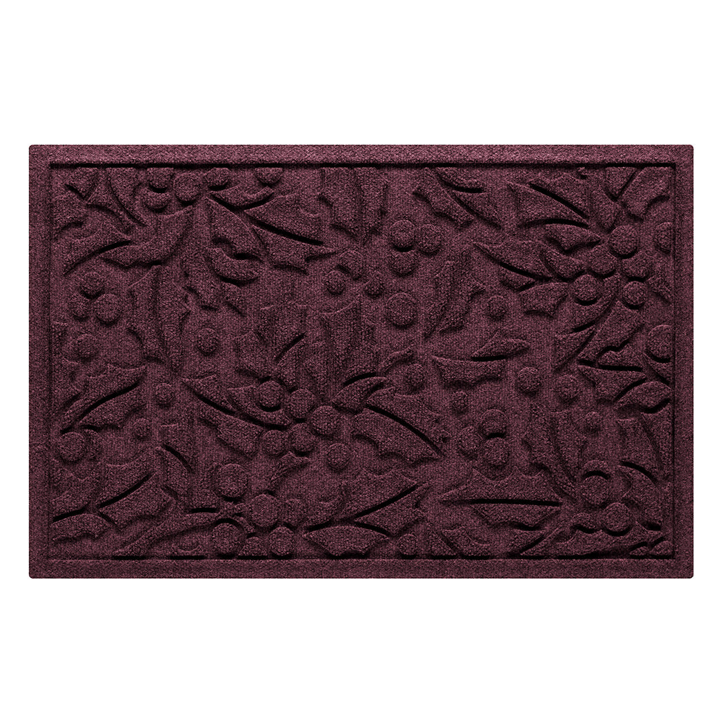 Deep red wine colored indoor/outdoor doormat withholly pattern on a white background