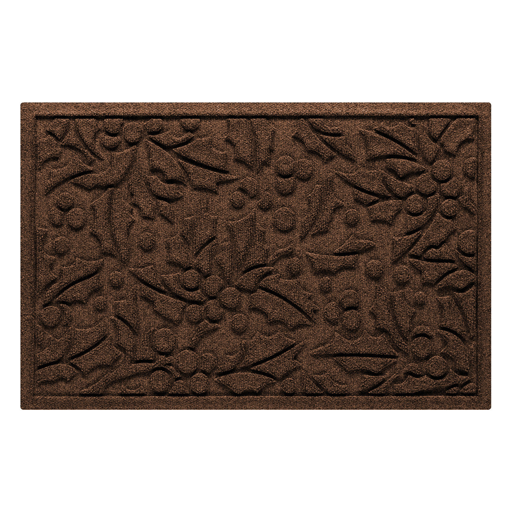 Brown doormat with textured holly pattern on a white background