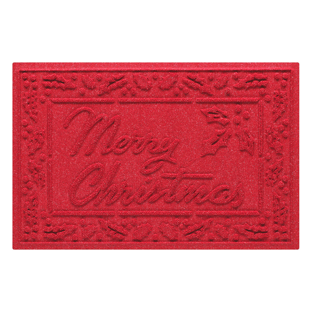 Bright red doormat with 'Merry Christmas' text and a holly decorative boarder on a white background
