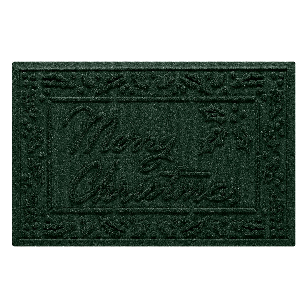 A deep green doormat with 'Merry Christmas' text and holy decorative border on a white background