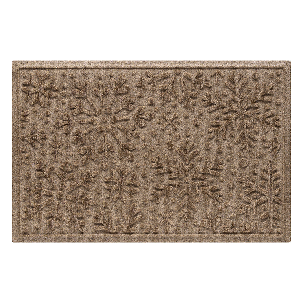 Brown doormat with snowflake pattern on a white background