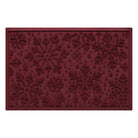 Deep red doormat with floral pattern on a white background