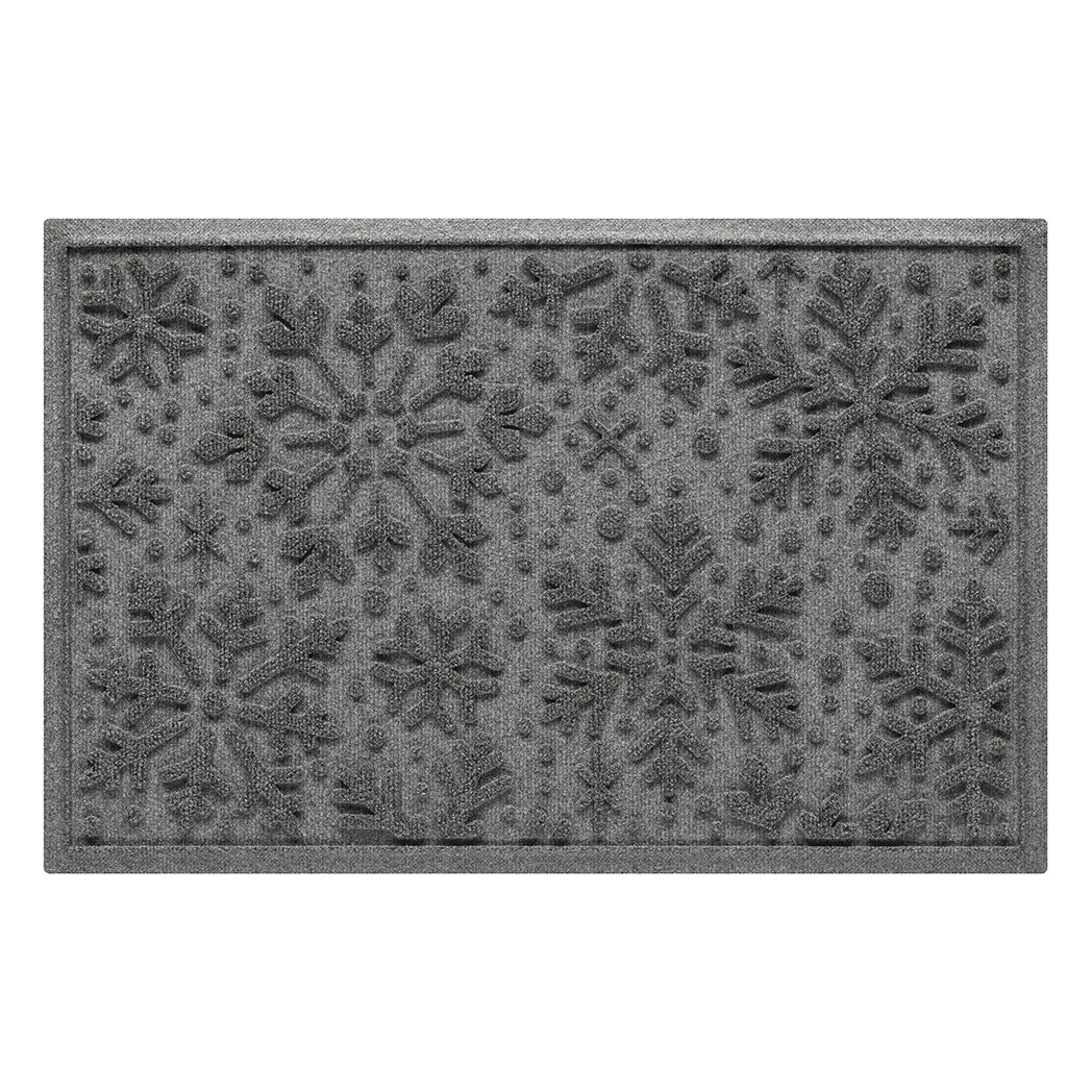 Gray doormat with bi-level snowflake pattern on a white background
