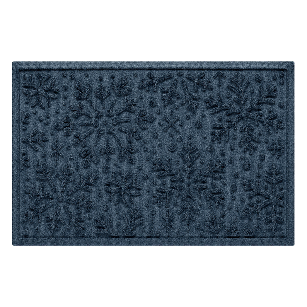 Navy blue indoor/outdoor doormat with a textured snowflake pattern on a white background