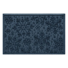 Navy blue indoor/outdoor doormat with a textured snowflake pattern on a white background