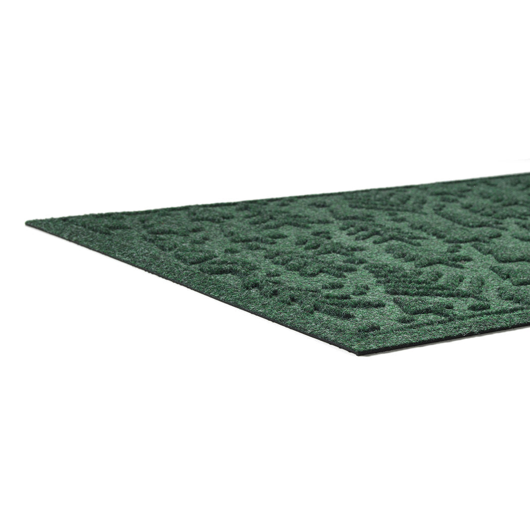 Green textured low-profile mat on a white background