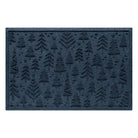 Navy blue doormat with holiday tree pattern on a white background