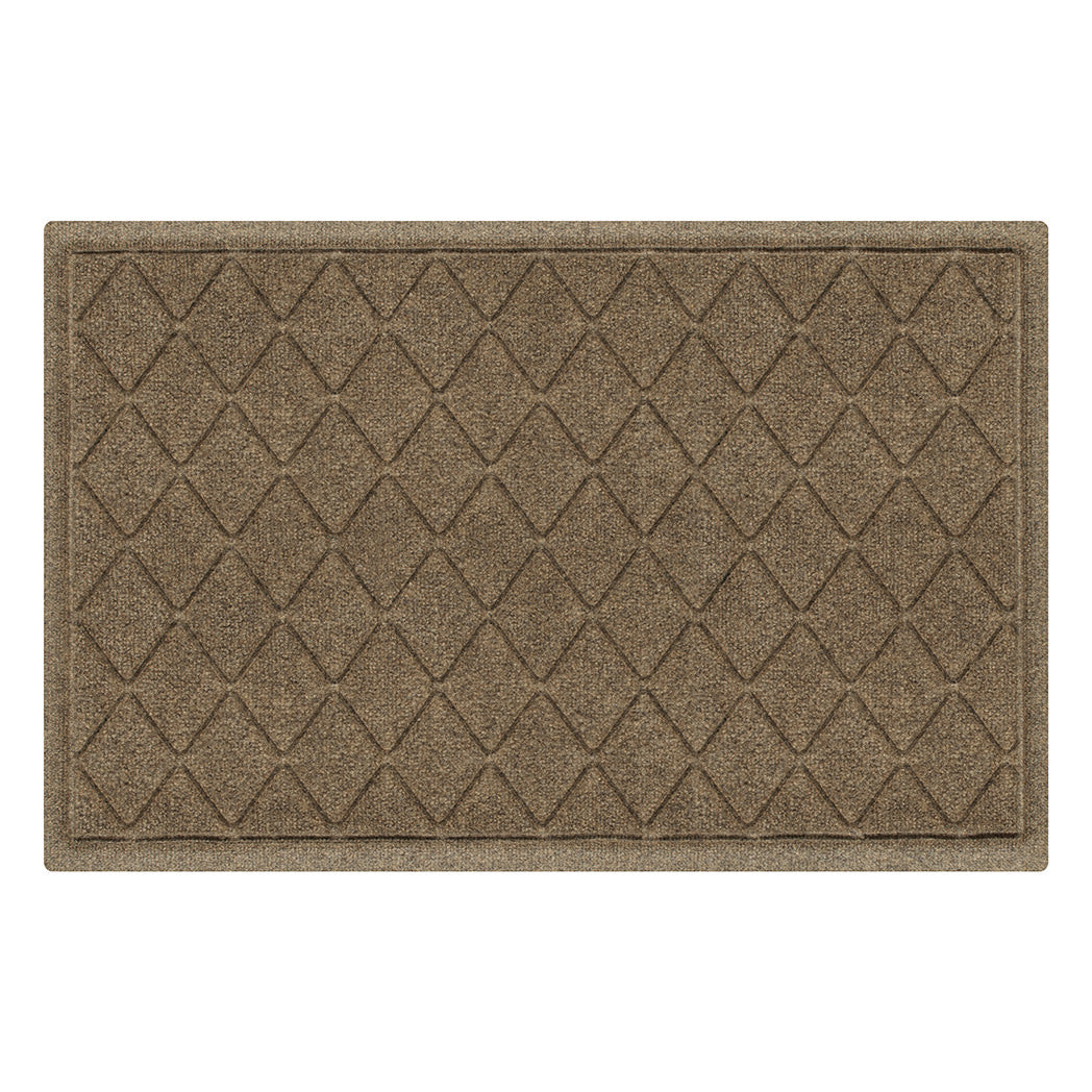 Overhead of a medium Argyle WaterHog indoor/outdoor door mat with a light tan color and interlocking diamond, bi-level design for scraping bottoms of shoes onto the mat.