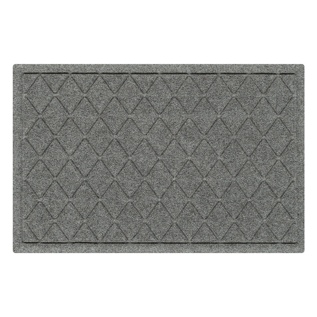 Overhead of a WaterHog medium-sized premium doormat in a light grey interlocking diamond pattern molded on a bi-level surface.