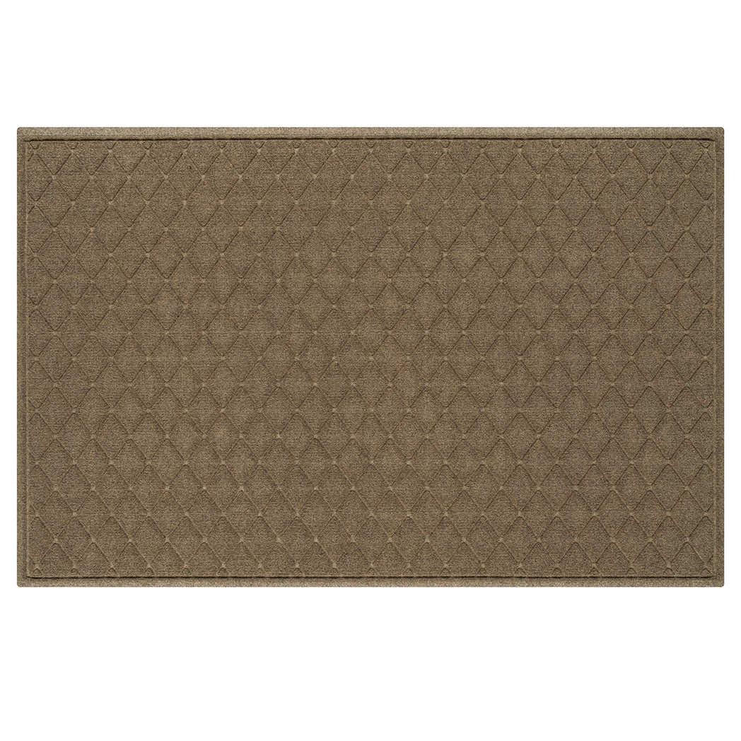 An OG WaterHog 4x6 indoor/outdoor door mat in a light tan with an interlocking diamond design made from stain-resistant fibers for a great life.