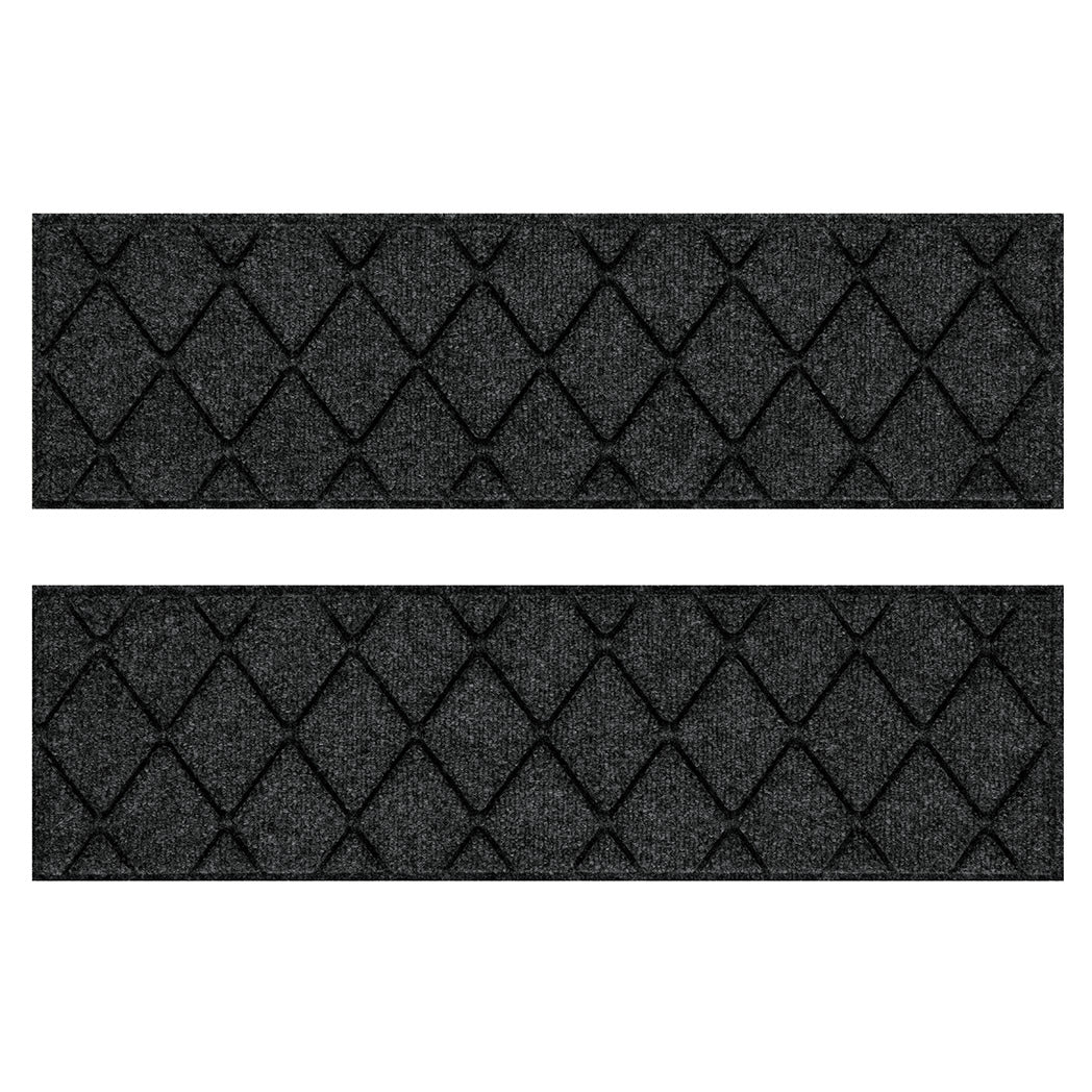 Pair of WaterHog Argyle modern stair treads with a deep grey interlocking diamond design, backed by Matter's durable rubber backing.