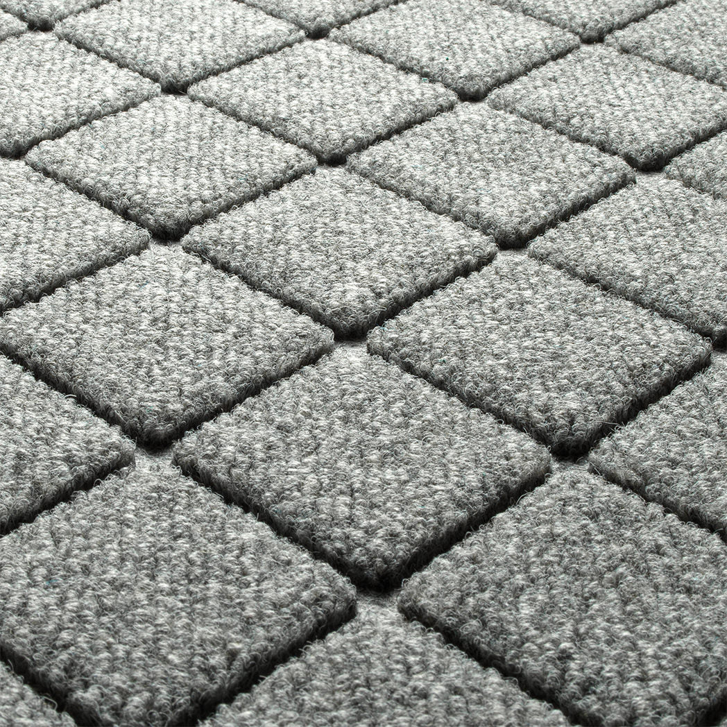 Blown-up view of Argyle's fade-resistant surface creating a light grey, bi-level surface perfect to scraping mud and ice off the bottom of shoes.