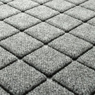 Blown-up view of Argyle's fade-resistant surface creating a light grey, bi-level surface perfect to scraping mud and ice off the bottom of shoes.
