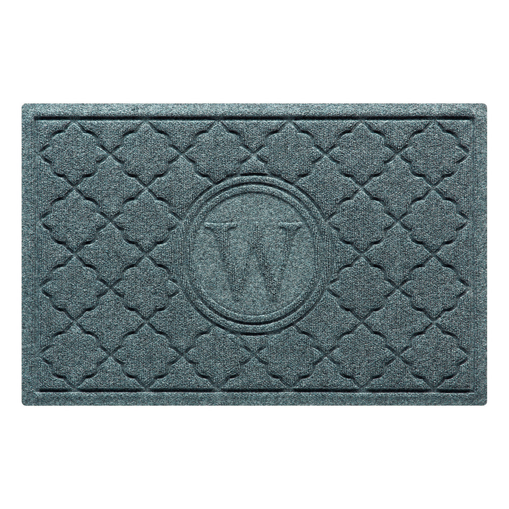 Isolated image of a medium size outdoor WaterHog Bombay Monogrammed Door mat that features a classic repeating geometric pattern with an encircled letter placed in the center; shown in a blue-grey color.