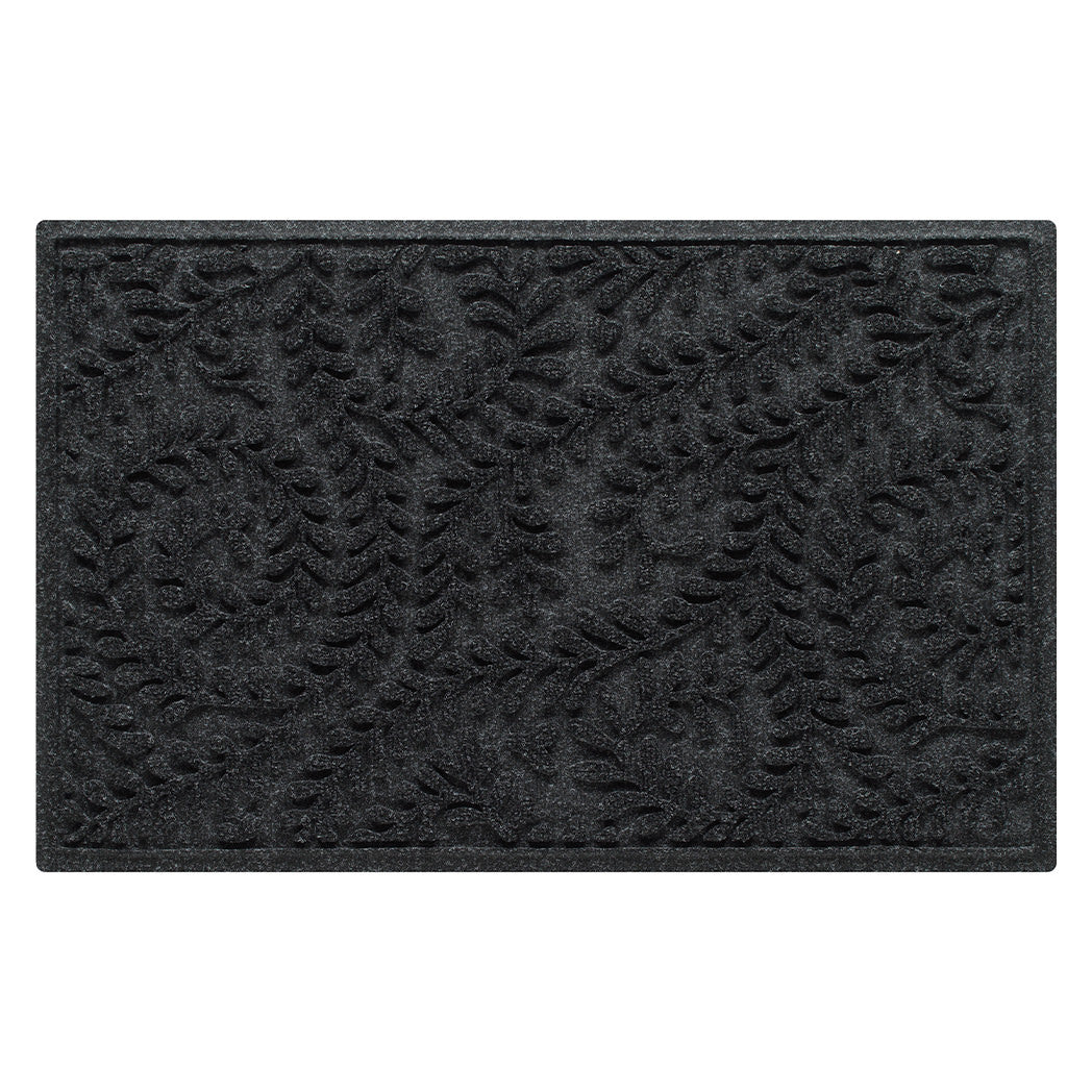 An overhead of a WaterHog 2x3 indoor/outdoor modern door mat with a deep grey curling botanical, bi-level design for efficient cleaning.