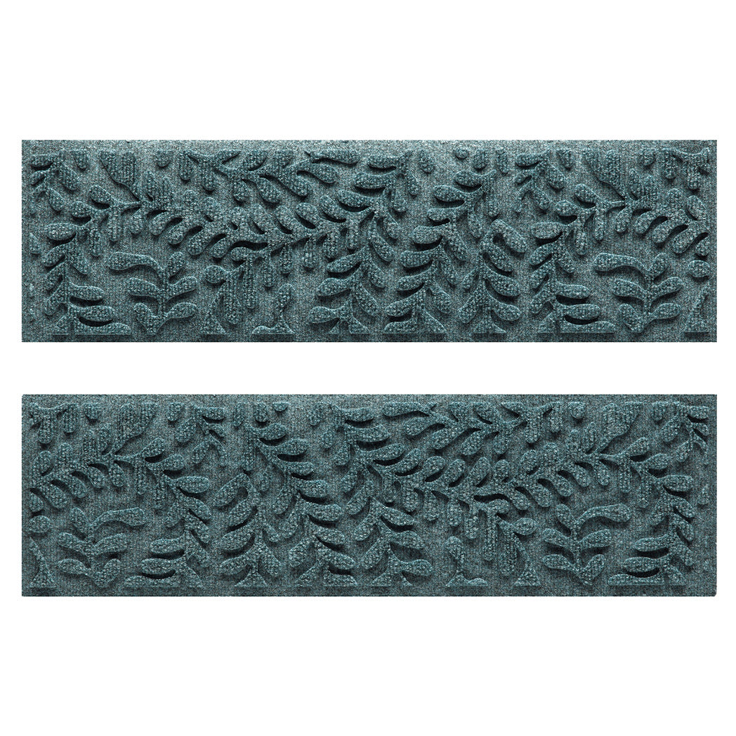 Pair of WaterHog Boxwood all-weather stair treads in a light blue/grey curling botanical, bi-level design.