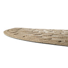 Side photo of genuine WaterHog half round highlighting the low-profile design of the recycled PET surface and durable rubber backing to help prevent sliding or tracking into your home.