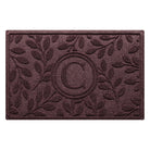 deep burgundy red wine colored WaterHog doormat with a monogrammed letter surrounded by beautiful foliage bi-level design made in the USA with recycled materials.