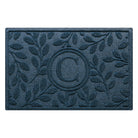 Deep blue genuine WaterHog doormat monogrammed with a letter in the center surrounded by a botanical leaf bi-level design perfect for scraping shoes and trapping moisture, dirt, and debris.