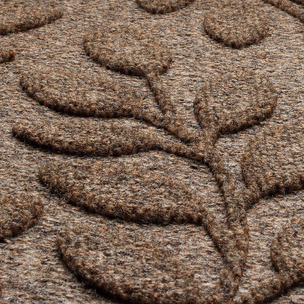 Close-up of recycled PET surface on a WaterHog doormat. Leafy pattern in a bi-level design to help scrape shoes and prevent tracking into your home.