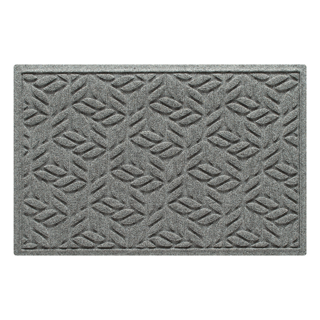 A WaterHog 2x3 indoor/outdoor modern doormat in a light grey leaf petal design, and eco-friendly, durable surface.