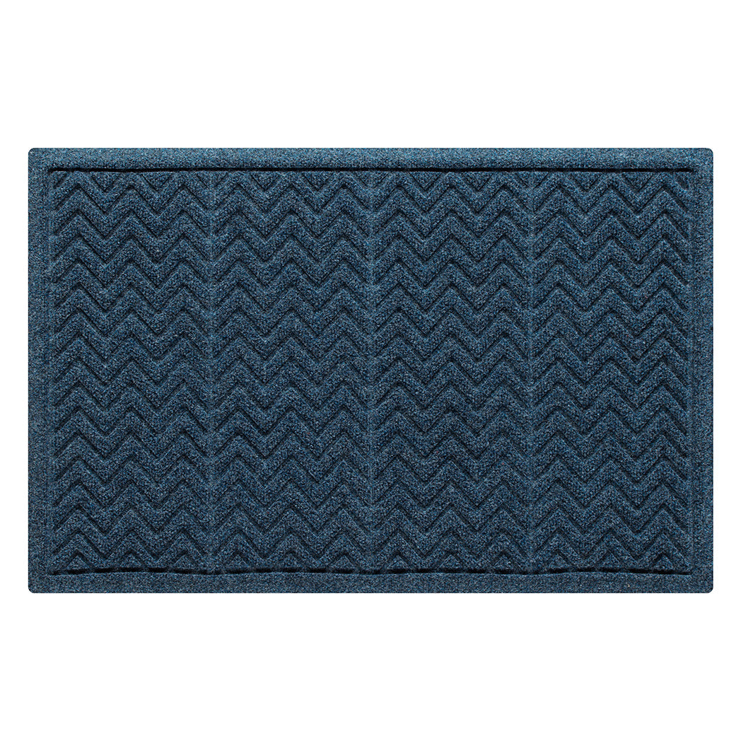 A genuine WaterHog doormat in a deep blue color with a textured zigzag or chevron pattern. Made of durable materials designed for trapping dirt, moisture, and debris.