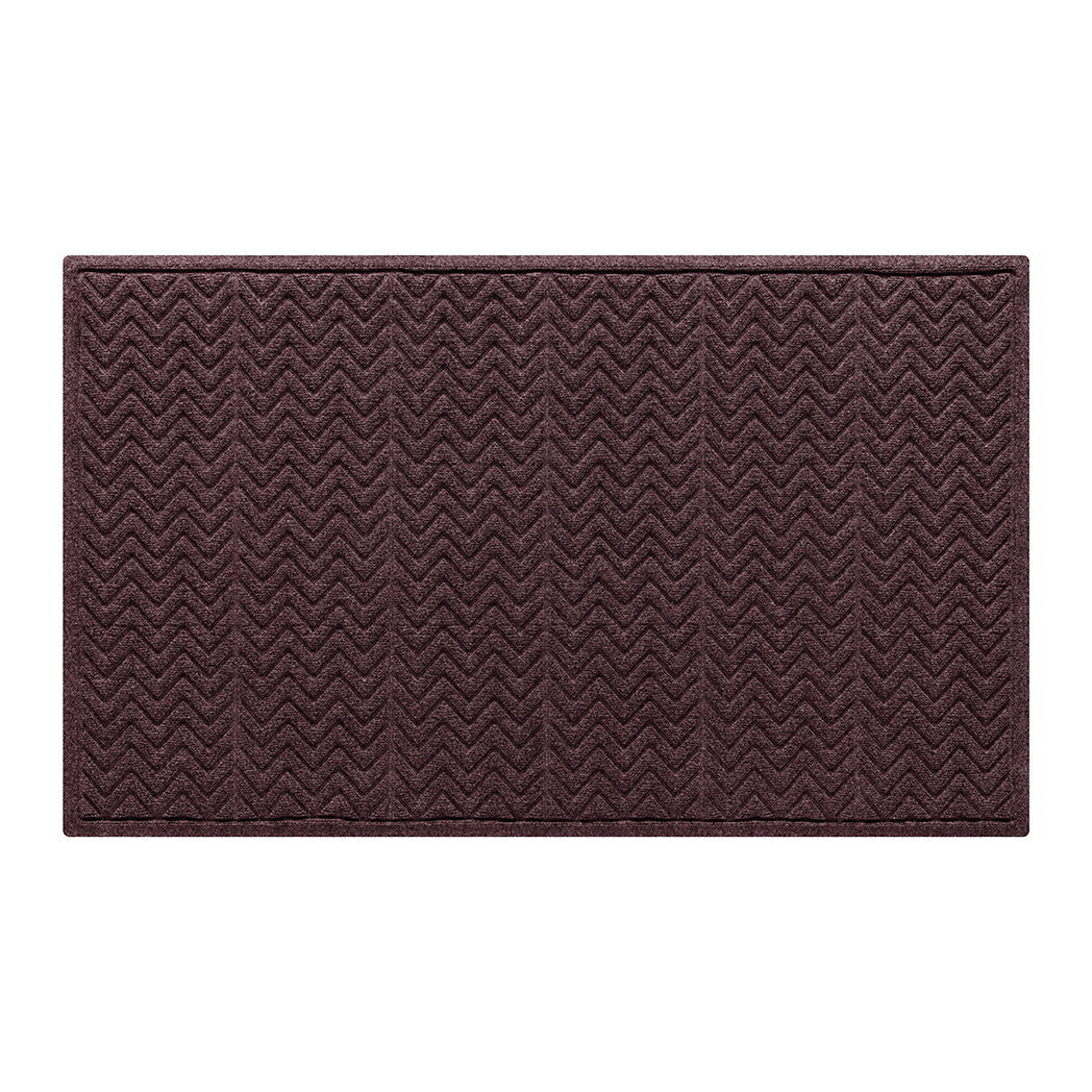 Deep red wine colored fibers make up the eco-friendly surface of this genuine WaterHog all-weather doormat with a zig-zag bi-level design