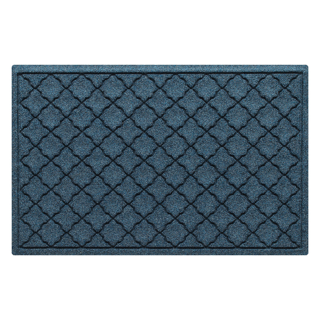 Overhead of a medium Cordova WaterHog indoor/outdoor door mat with a relaxed blue repeating quatrefoil pattern.