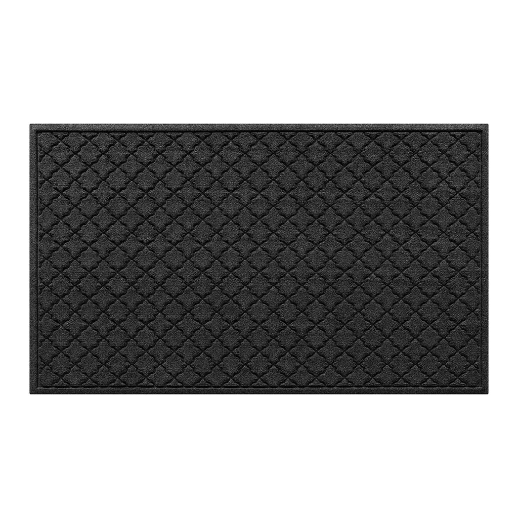 WaterHog 3x5 indoor/outdoor door mat with a deep grey surface and repeating quatrefoil pattern.