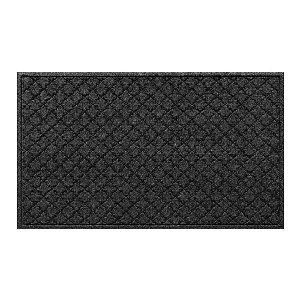 WaterHog 3x5 indoor/outdoor door mat with a deep grey surface and repeating quatrefoil pattern.