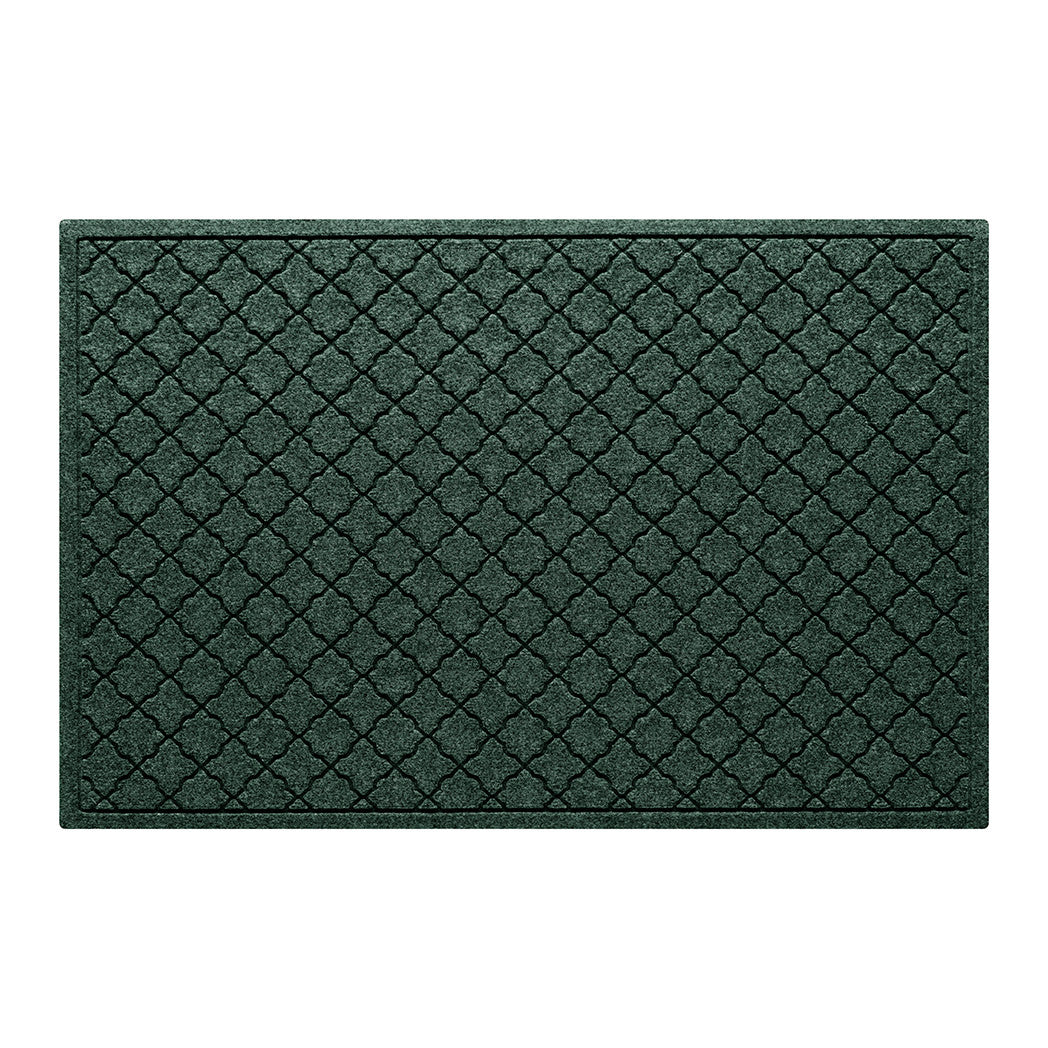An authentic WaterHog large premium door mat with a deep green surface and repeating quatrefoil pattern.