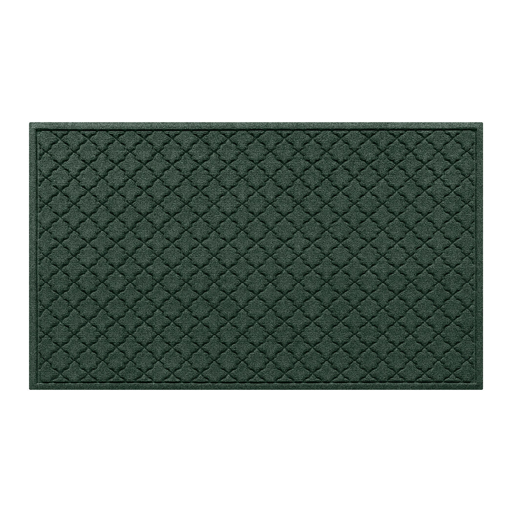 An authentic WaterHog large premium door mat with a deep green surface and repeating quatrefoil pattern.