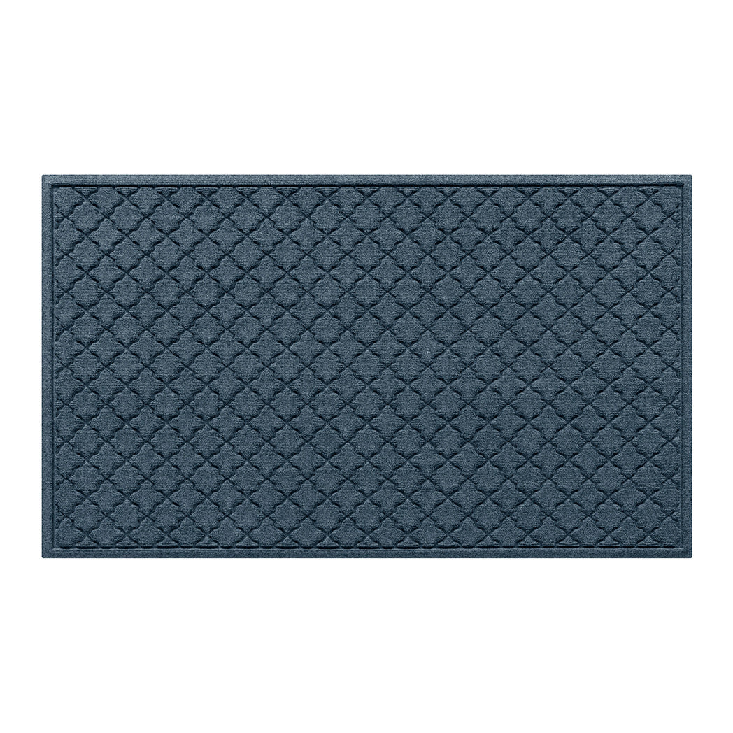 Overhead of a large Cordova outdoor door mat with a relaxed blue repeating quatrefoil pattern.
