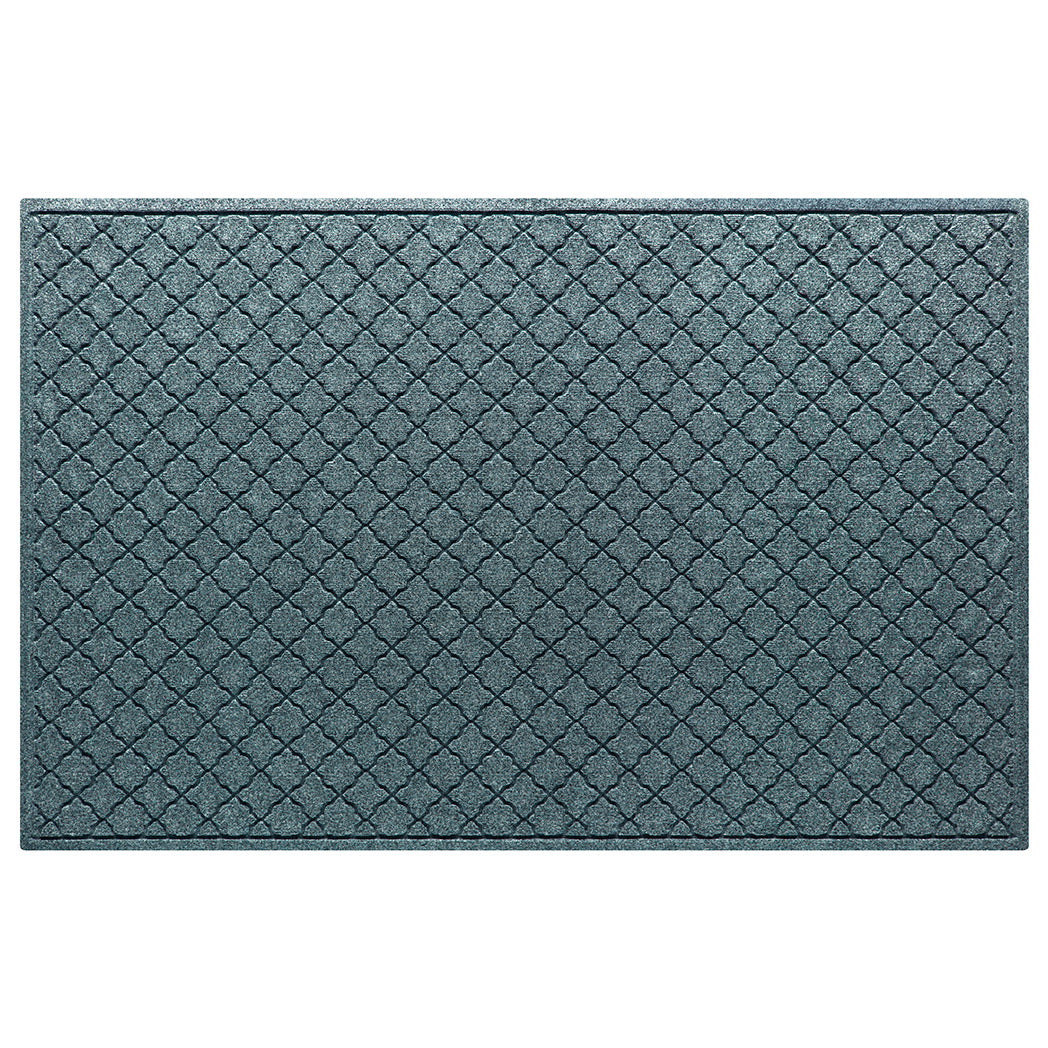 A Cordova WaterHog XL outdoor doormat in a light blue/grey repeating quatrefoil, bi-level design.