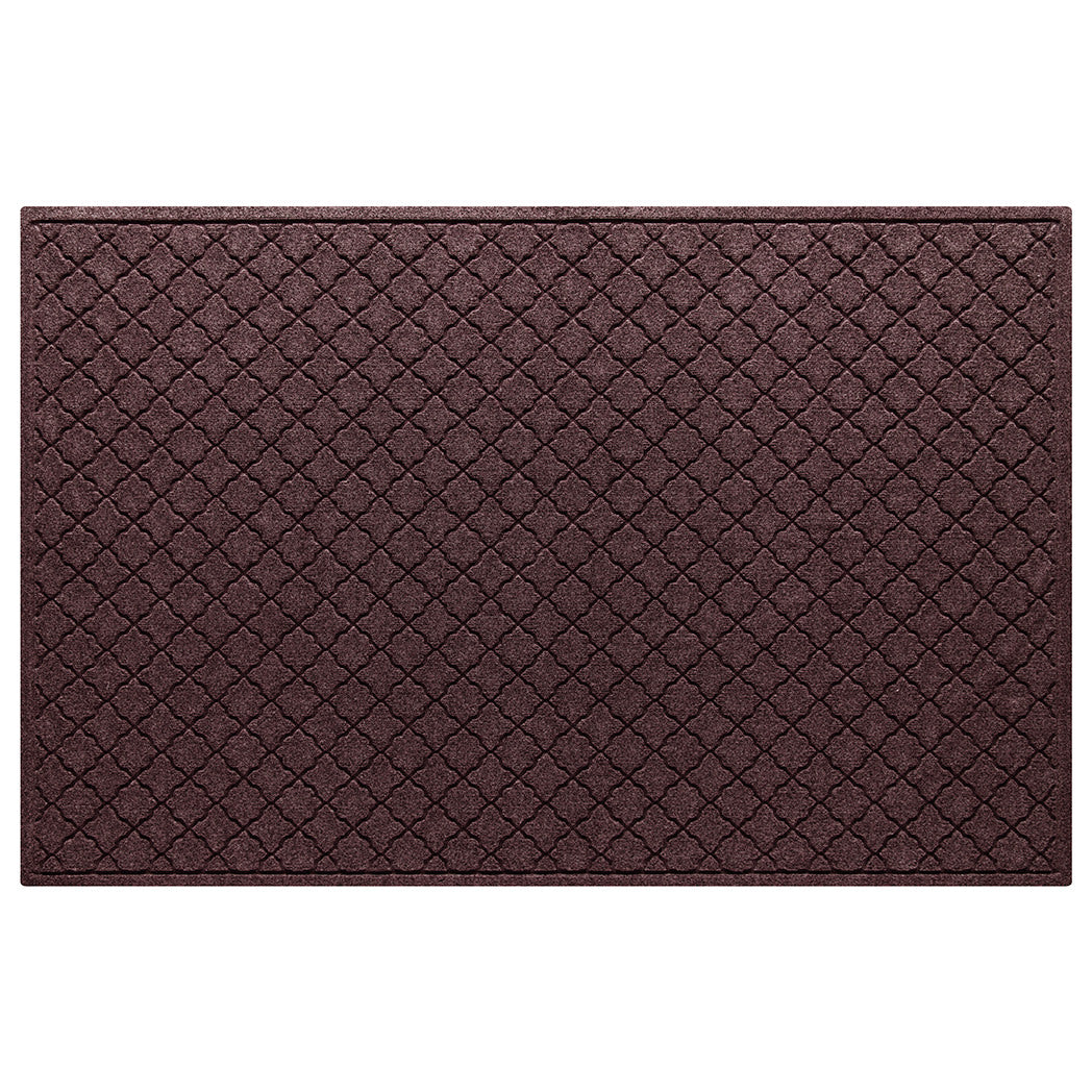 A Cordova WaterHog 4x6 all-weather door mat with a deep wine red repeating quatrefoil design.