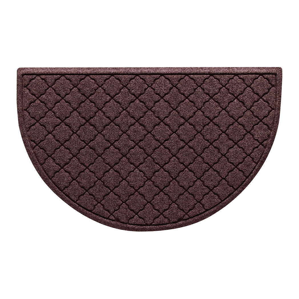 A half-round WaterHog all-weather doormat with a deep wine red surface and repeating quatrefoil pattern.