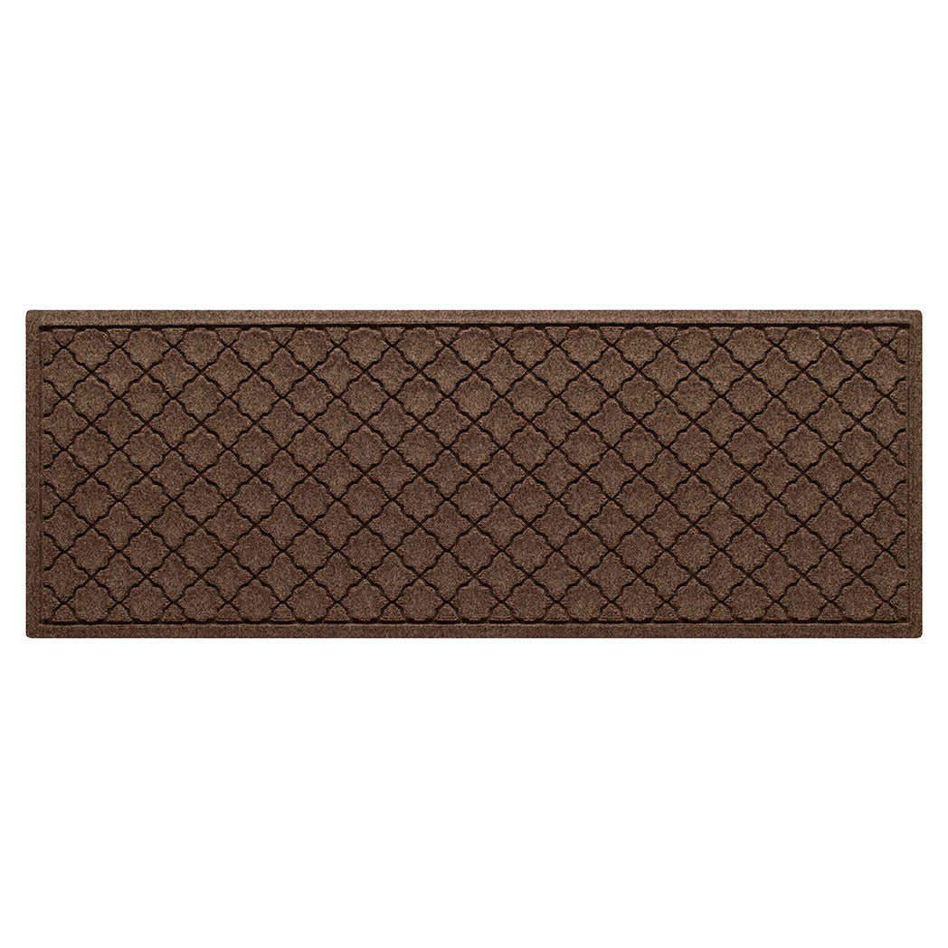 Overhead of a small Cordova WaterHog runner in a dark earthy brown, repeating quatrefoil pattern.