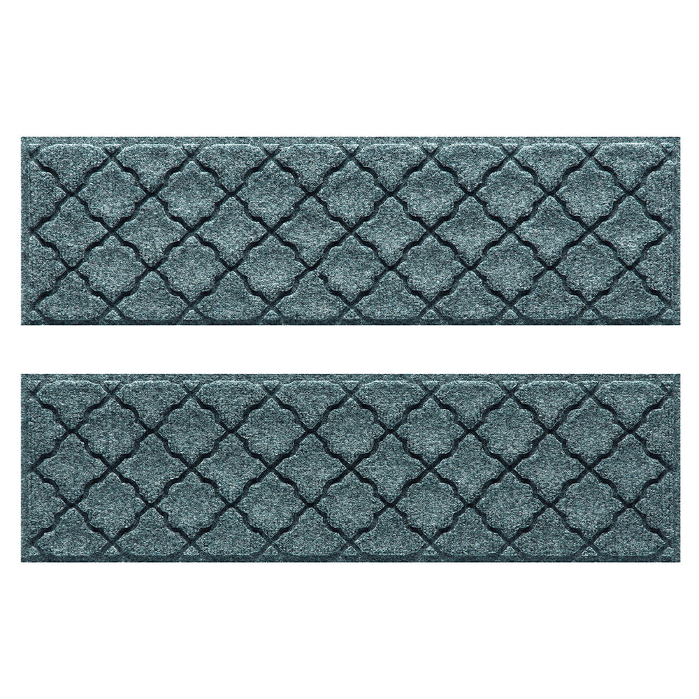 Pair of WaterHog Cordova fade-resistant stair treads  in a light blue/grey repeating quatrefoil, bi-level design.