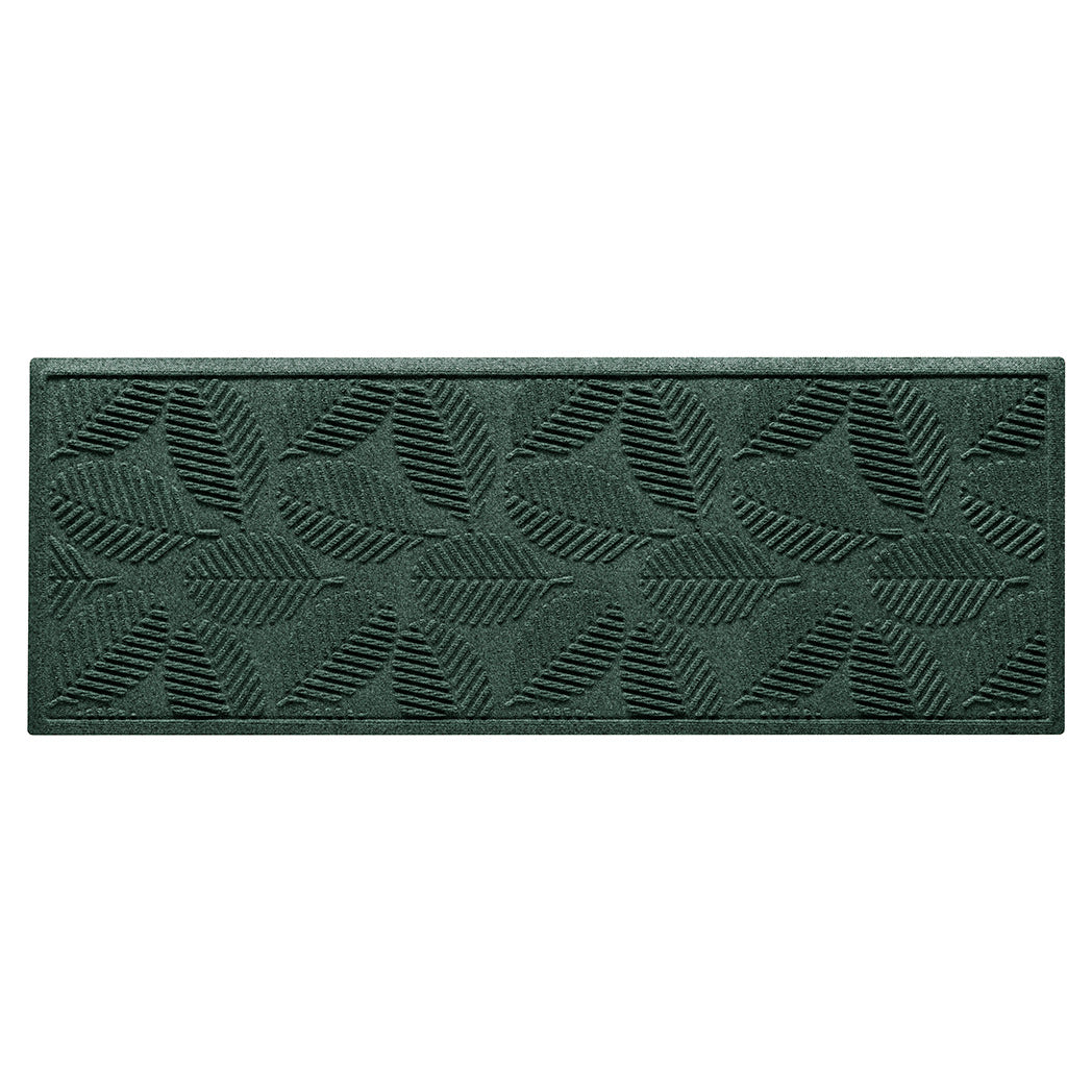 A genuine WaterHog small indoor/outdoor runner with a deep green leafy design, an American-made mat.
