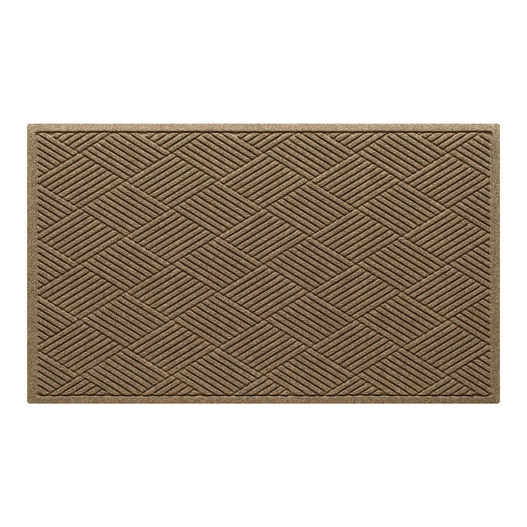 Overhead of a large WaterHog indoor/outdoor doormat with a light tan, repeating squares design; an American-made mat.