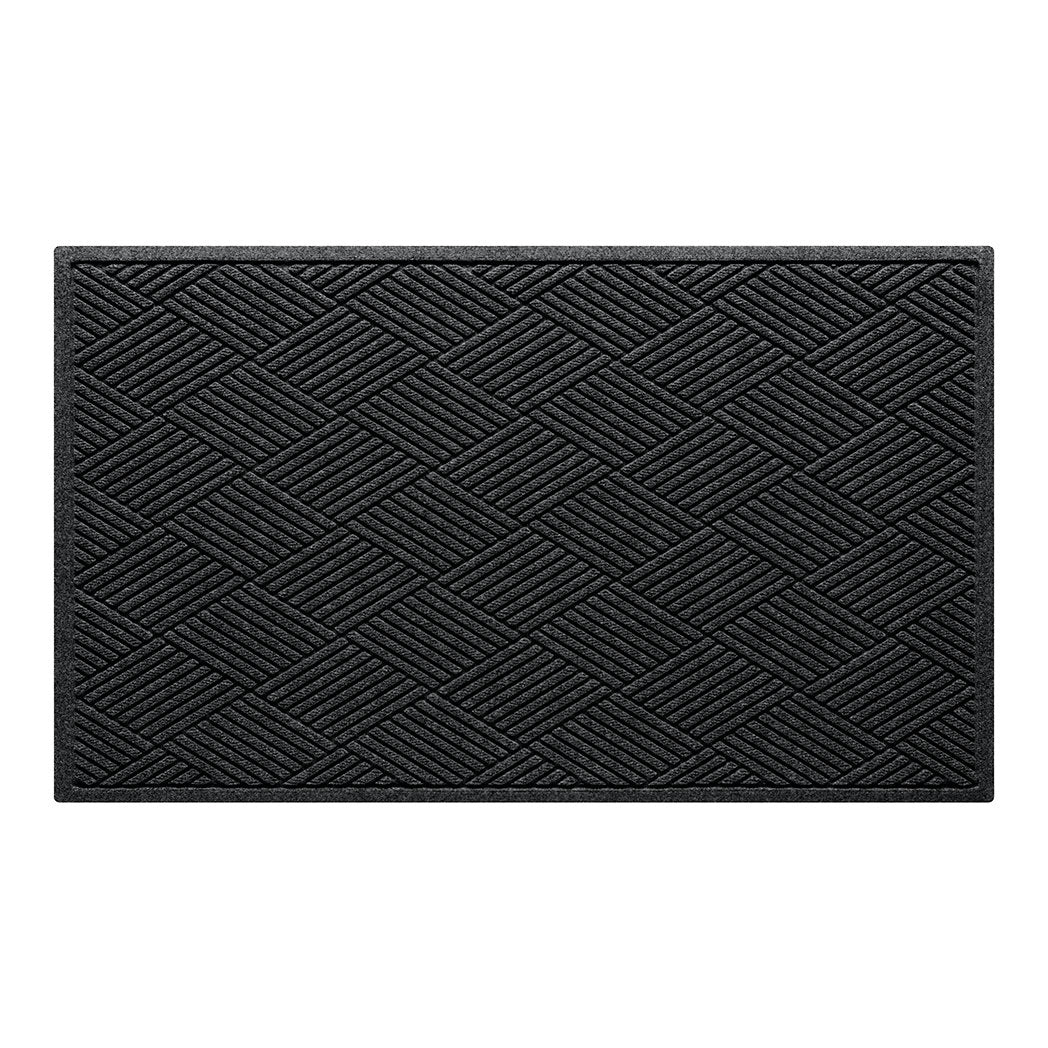 Overhead of a WaterHog 3x5 indoor/outdoor door mat with a deep grey surface and crisscrossing linear pattern.