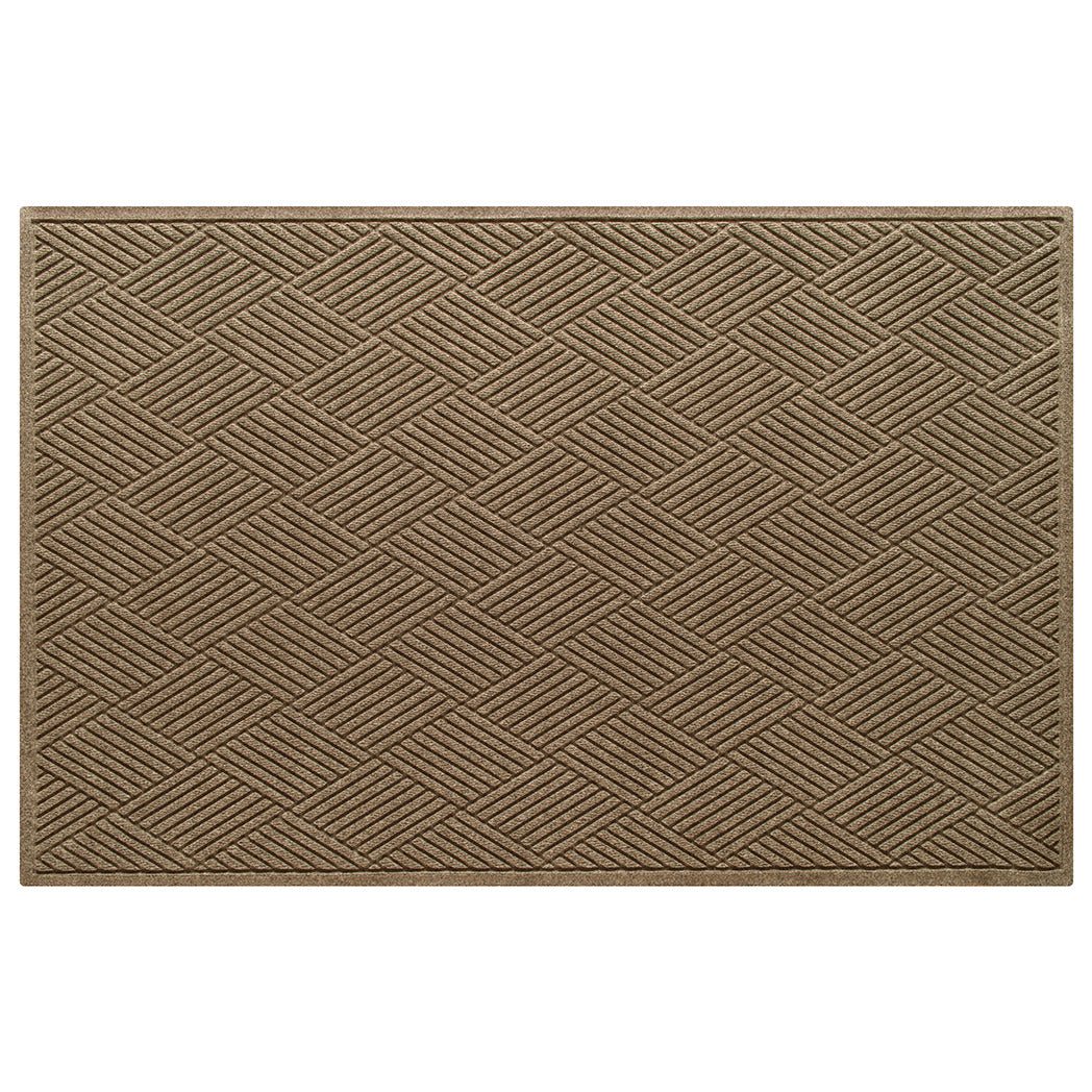 An OG WaterHog 4x6 indoor/outdoor doormat in a light tan crisscrossing linear, bi-level design.