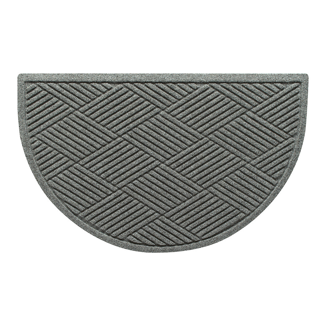Overhead of a WaterHog Boxwood doormat in a light grey surface and crisscrossing linear pattern.