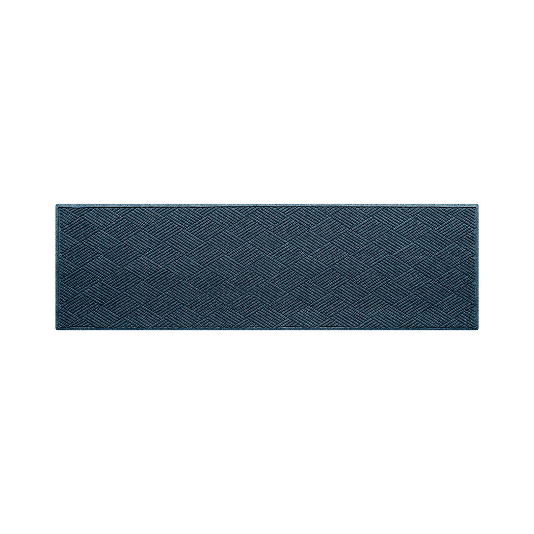 Navy blue all-weather runner doormat with a repetitive diamond pattern on a white background